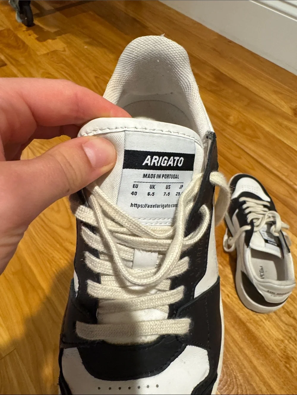 Axel Arigato Black and White Low-Top Sneakers